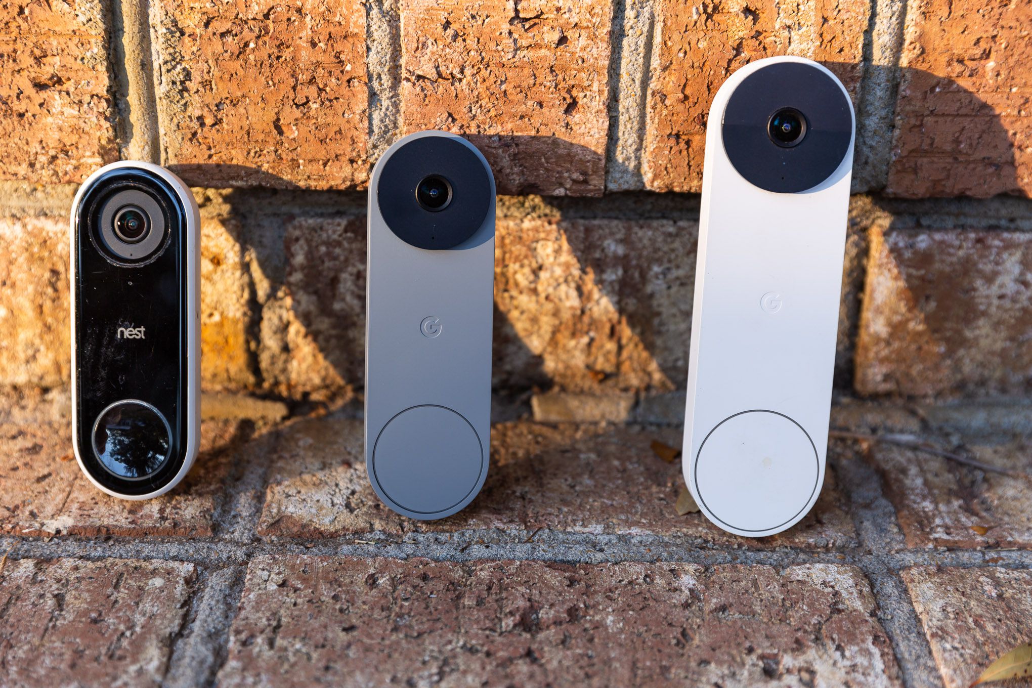 A Nest Doorbell Wired mounted on a front door, symbolizing home security and convenience.